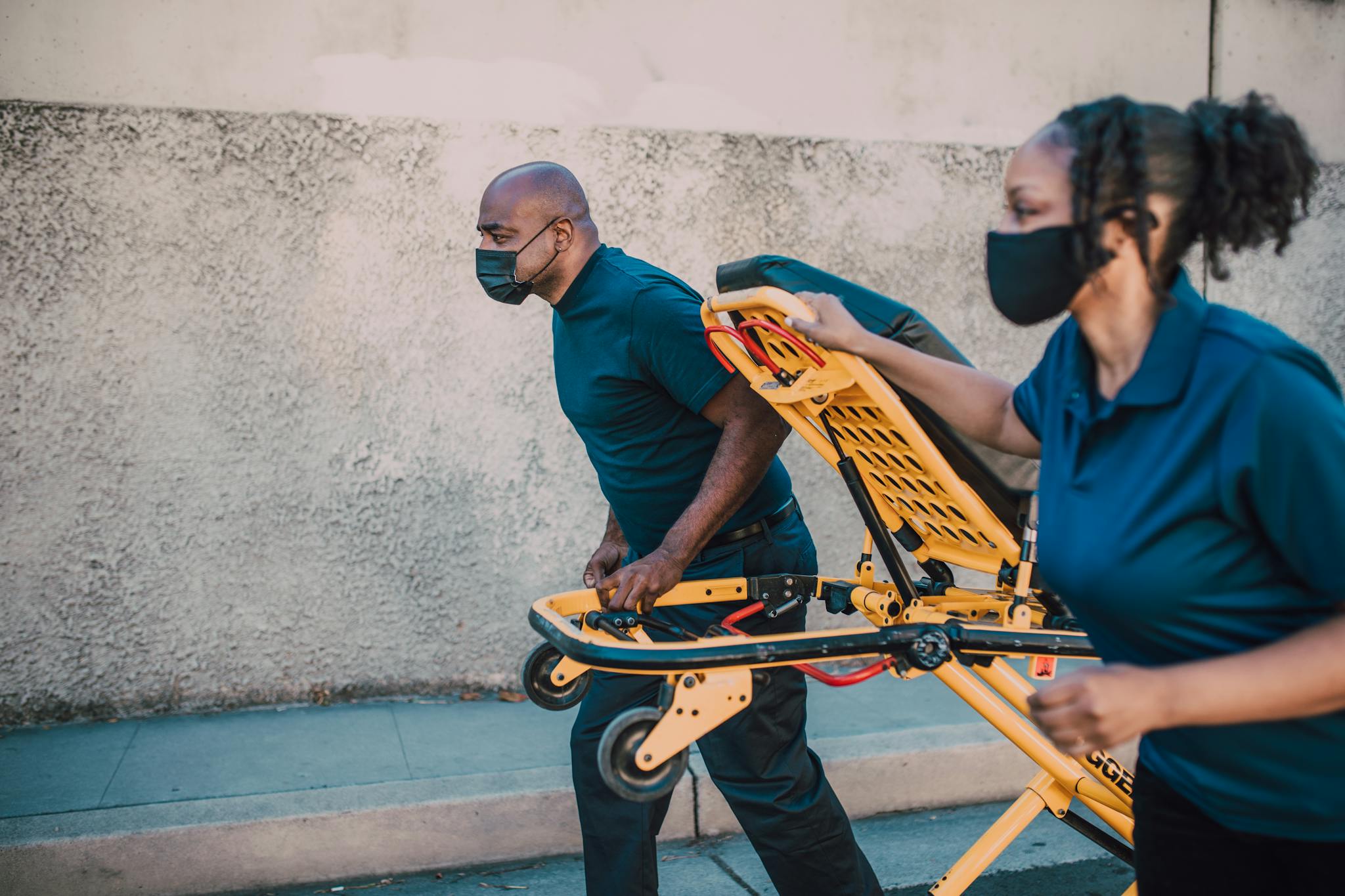 Paramedics Pulling a Stretcher